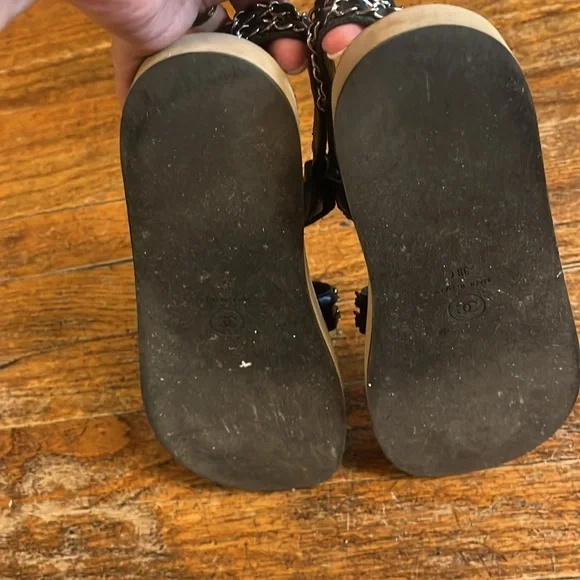 Chanel black leather and silver chain velcro logo sandals. Sandals